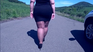Mature BBW in nylon pantyhose and high heels walks down the public road Foot fetish Big booty ASMR